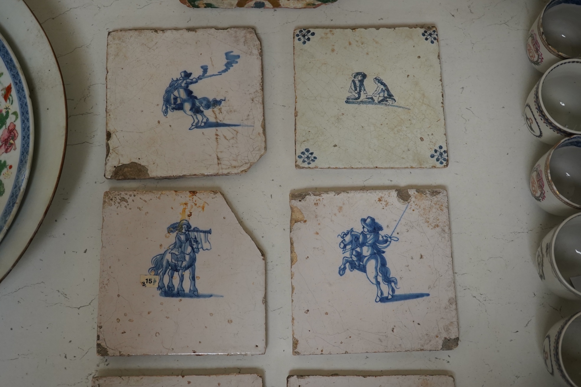 A collection of six assorted Delft tiles and one other, 18th century. Condition - varies